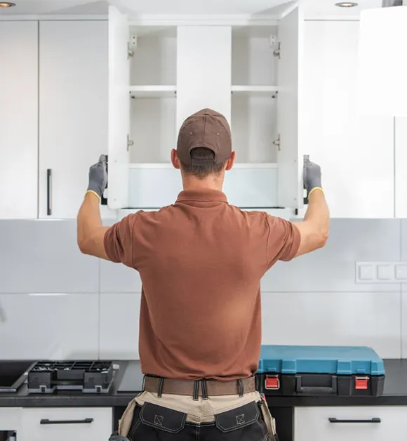 Custom kitchen cabinet installation services enhance storage organization and design aesthetics.